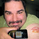 Illustration for article titled Zune Guy Looks Even Creepier with an iPod touch